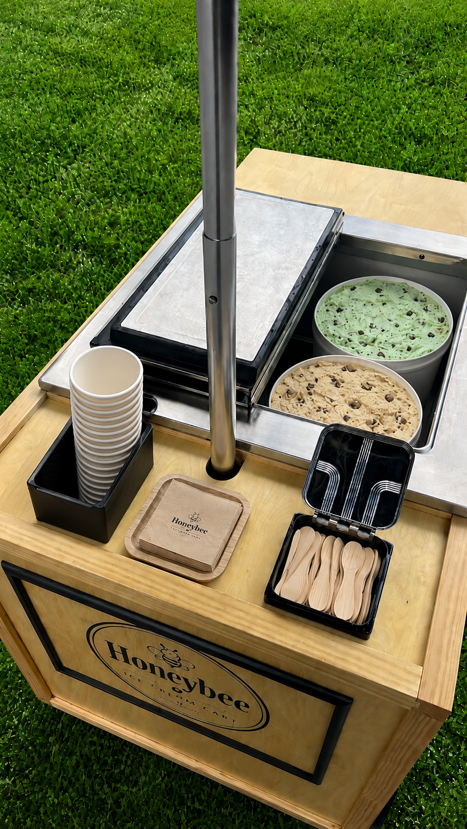HoneyBee cart top with containers, shelves, and freezer opening